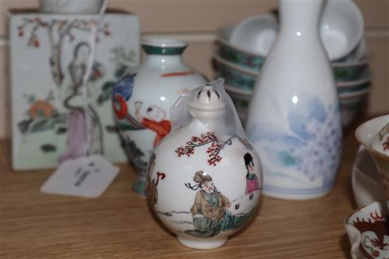 A Chinese blue and white barrel-shaped pot and cover and a quantity of Asian ceramics,